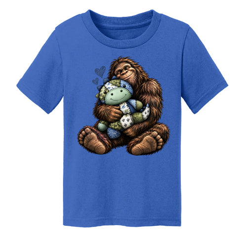 Royal - Bigfoot hugging a patchwork dinosaur toddler tee - FRONT